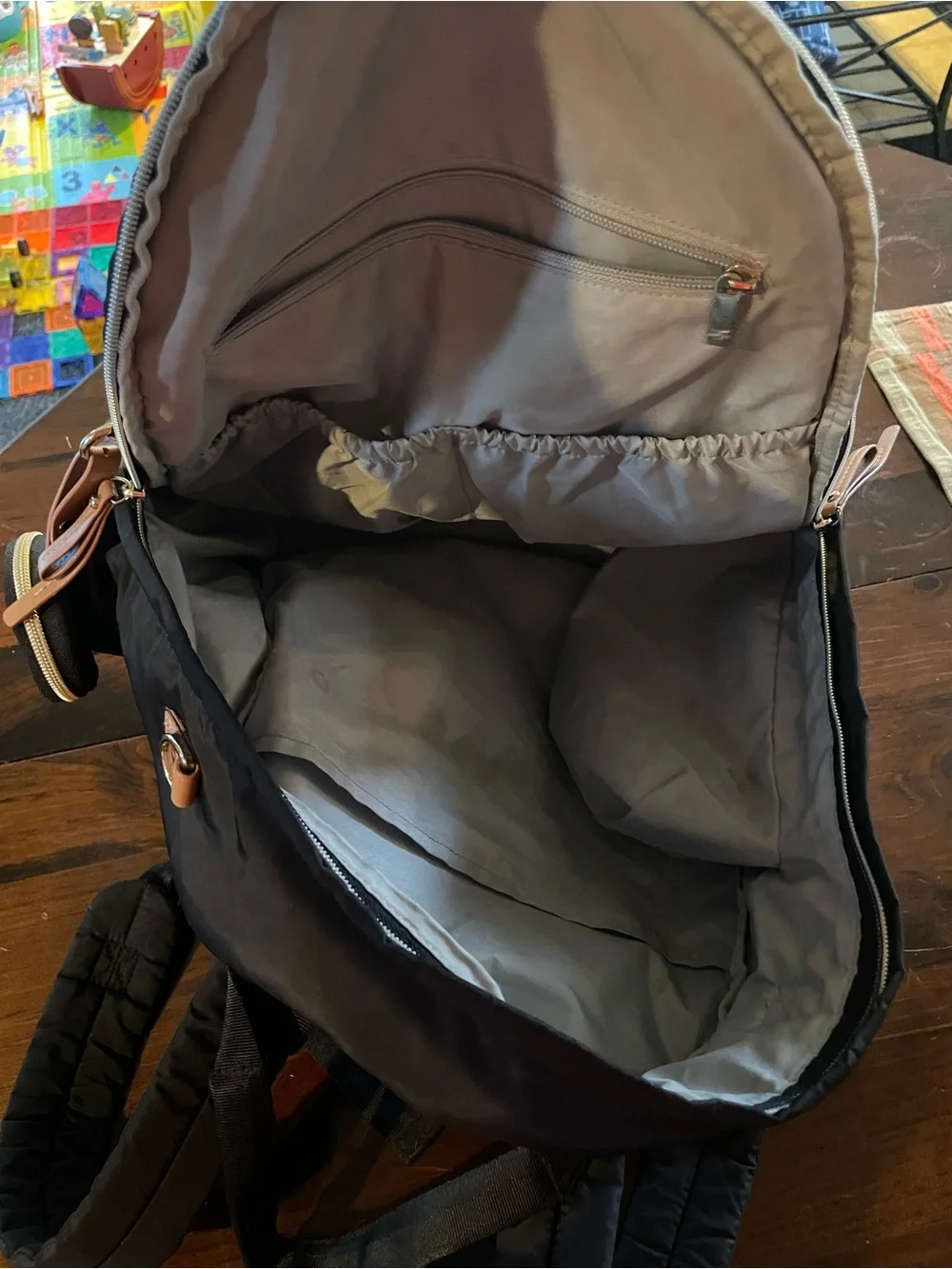 Skip Hop Black Quilted Diaper Backpack with Tan Trim